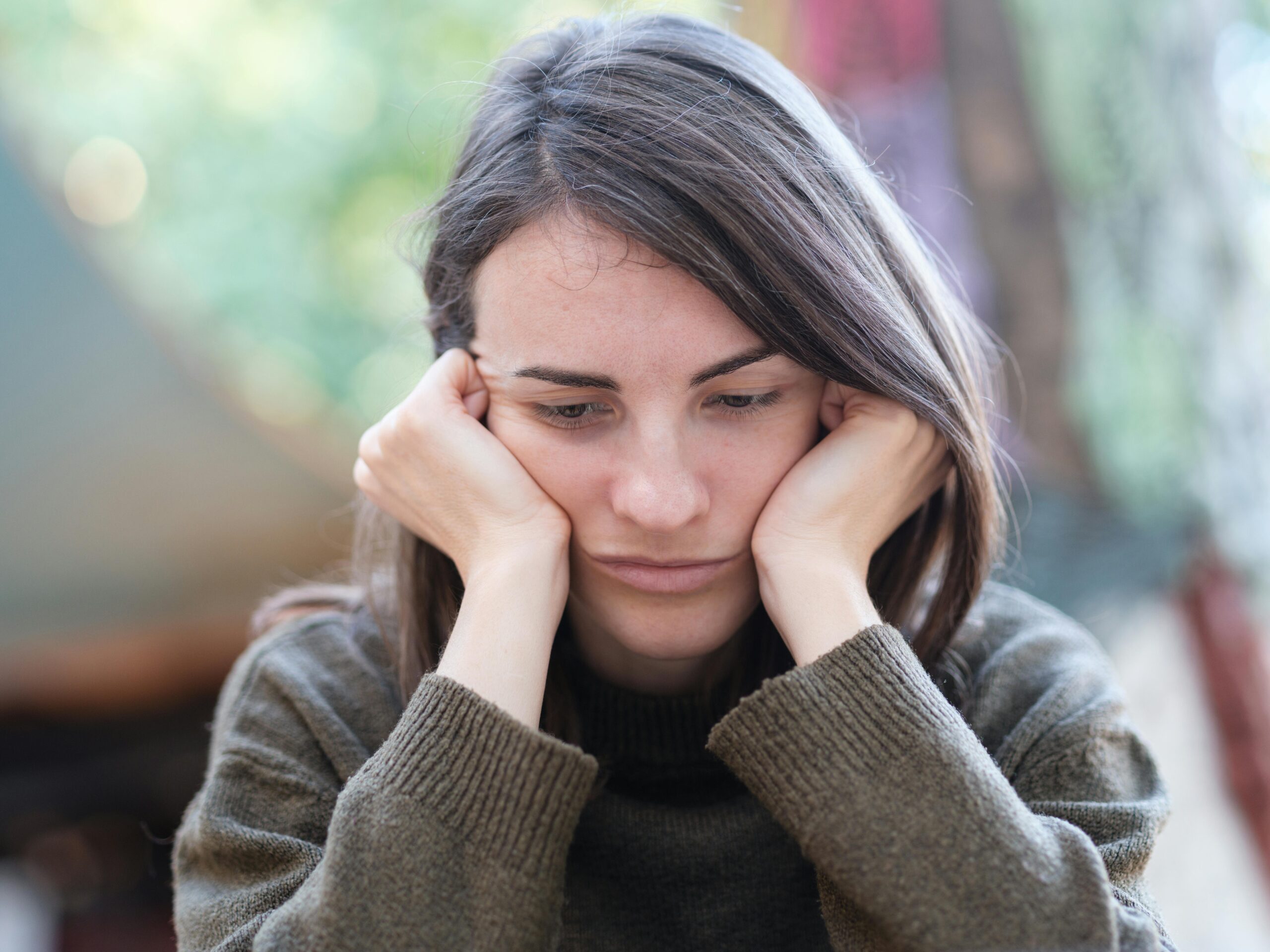 A worried woman feels pressured by friends to have an abortion before she is ready.