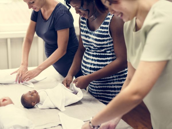 Pregnant women in a class